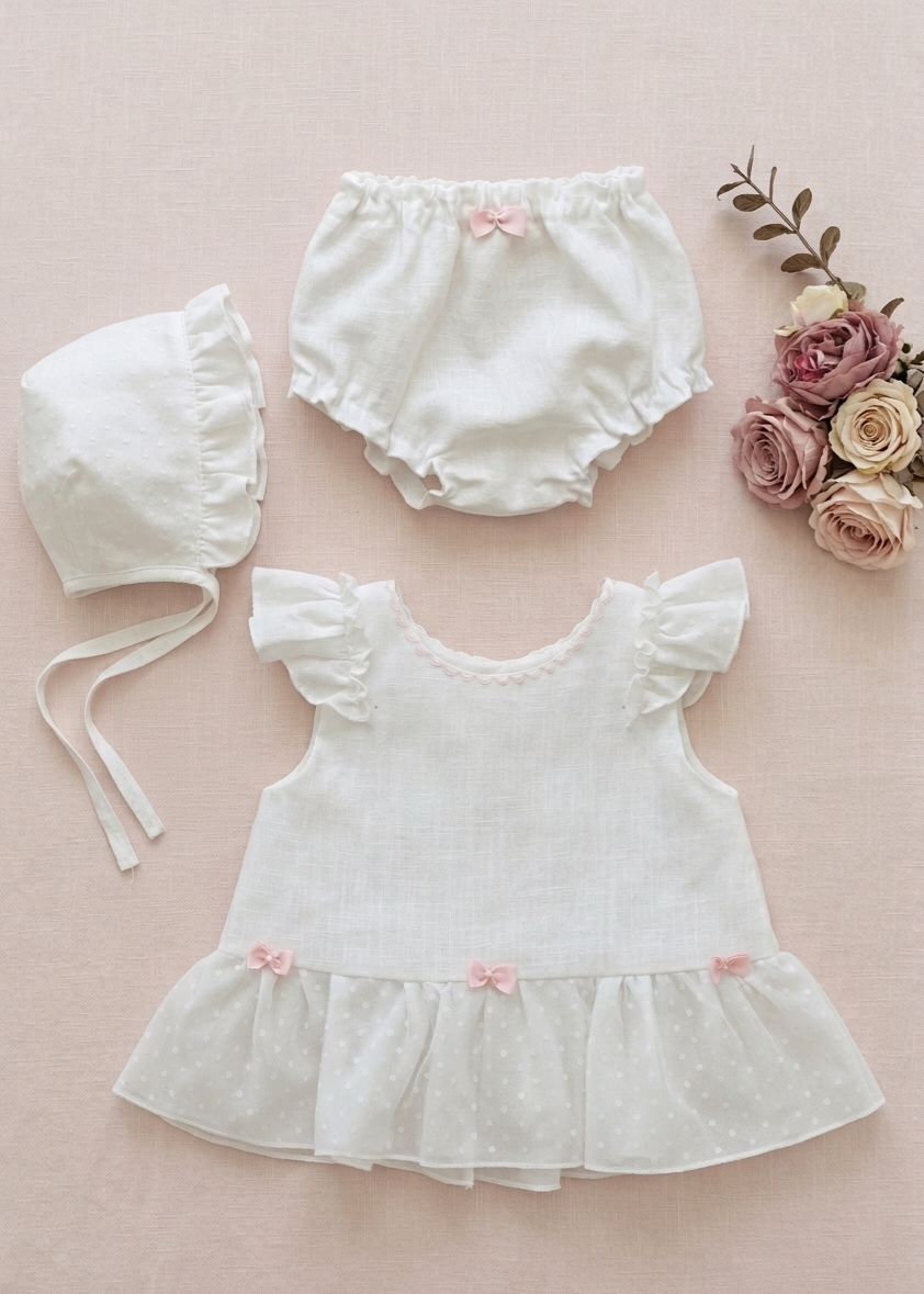 Conjunto artesanal de lino y plumeti con lazos en rosa